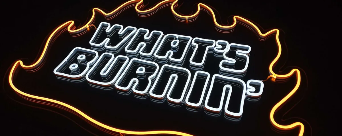 ‘What’s Burnin’ Cool White LED Neon Sign
